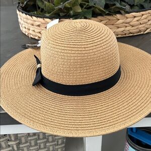 Elegant Tan Sun Hat with Black Band
